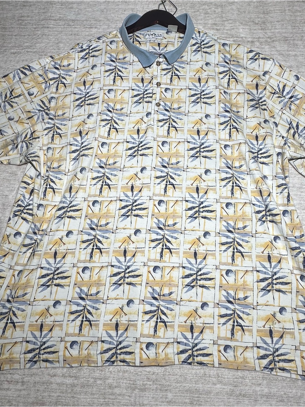 Original Penguin Men’s Polo in Cream with Blue and Yellow Print